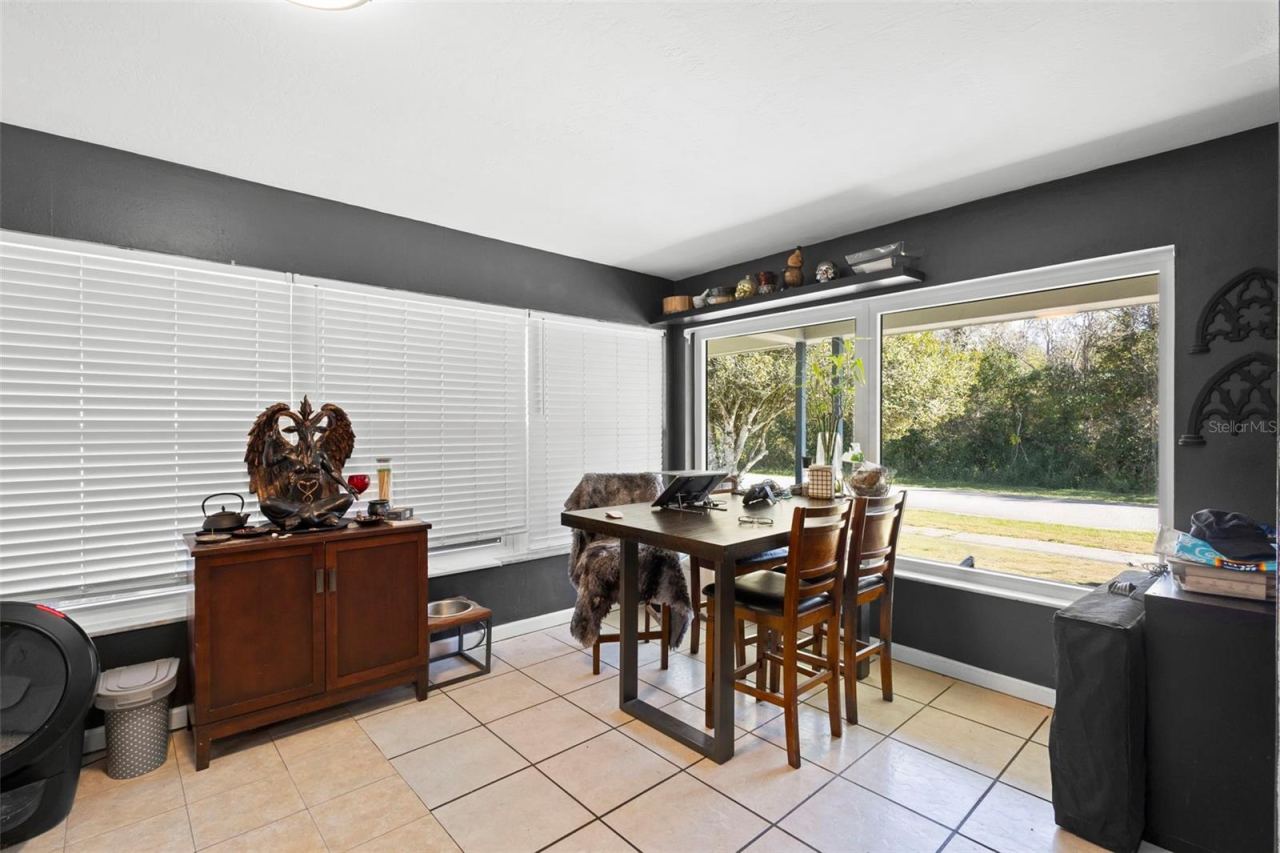 Photo 3 of 20: View of dining area toward front of property and entrance.