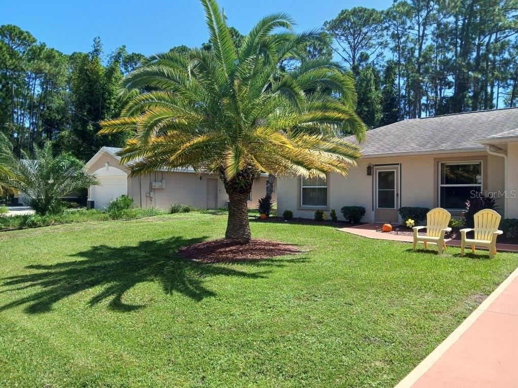 Photo 16 of 18: Gorgeous Palm sets off the curb appeal