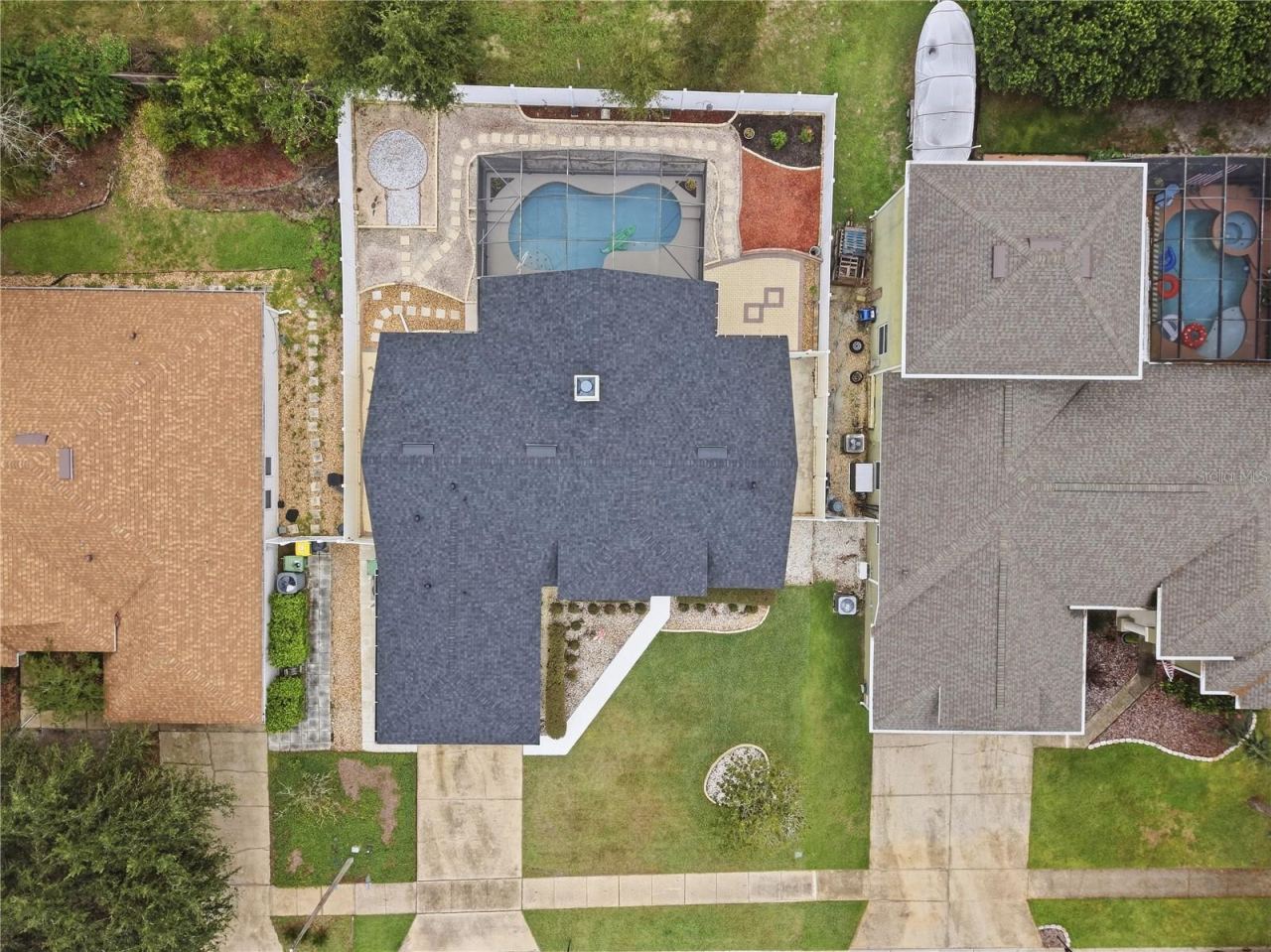 Photo 2 of 20: Overhead shot of 1420 Bent Oaks -- highlites new roof, fully fenced yard, low maintenance back yard!