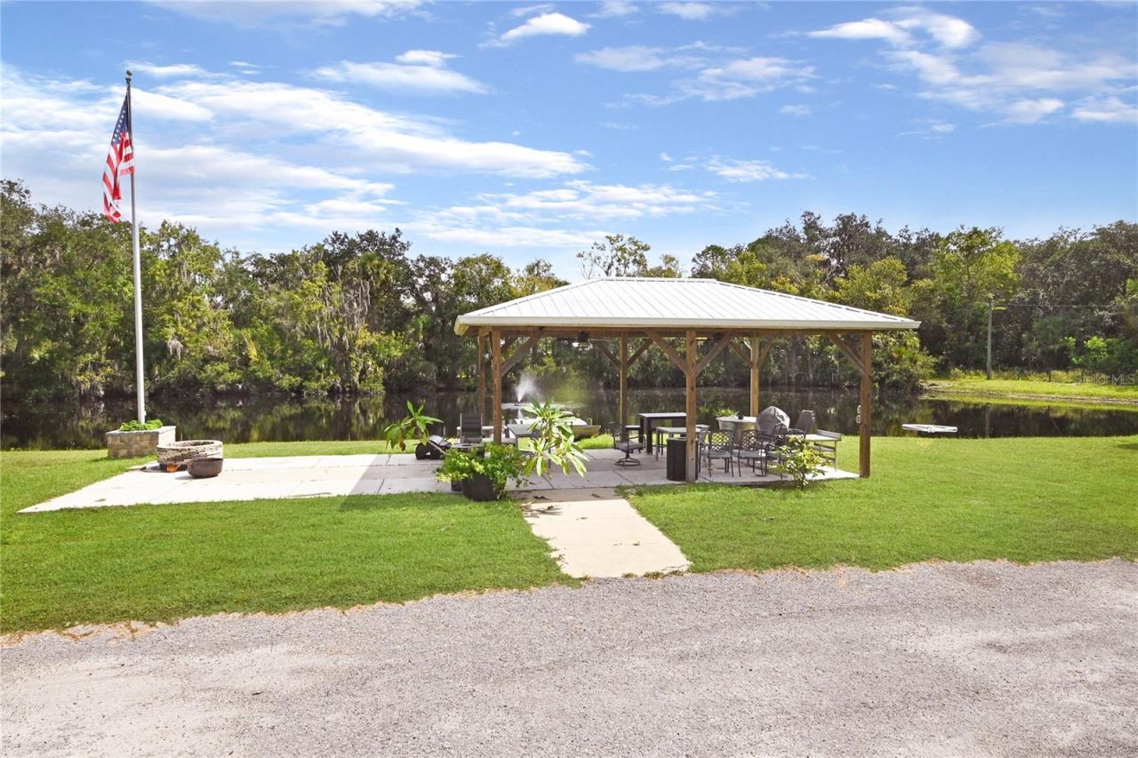 Photo 8 of 20: Pavilion is lakefront great for get togethers.