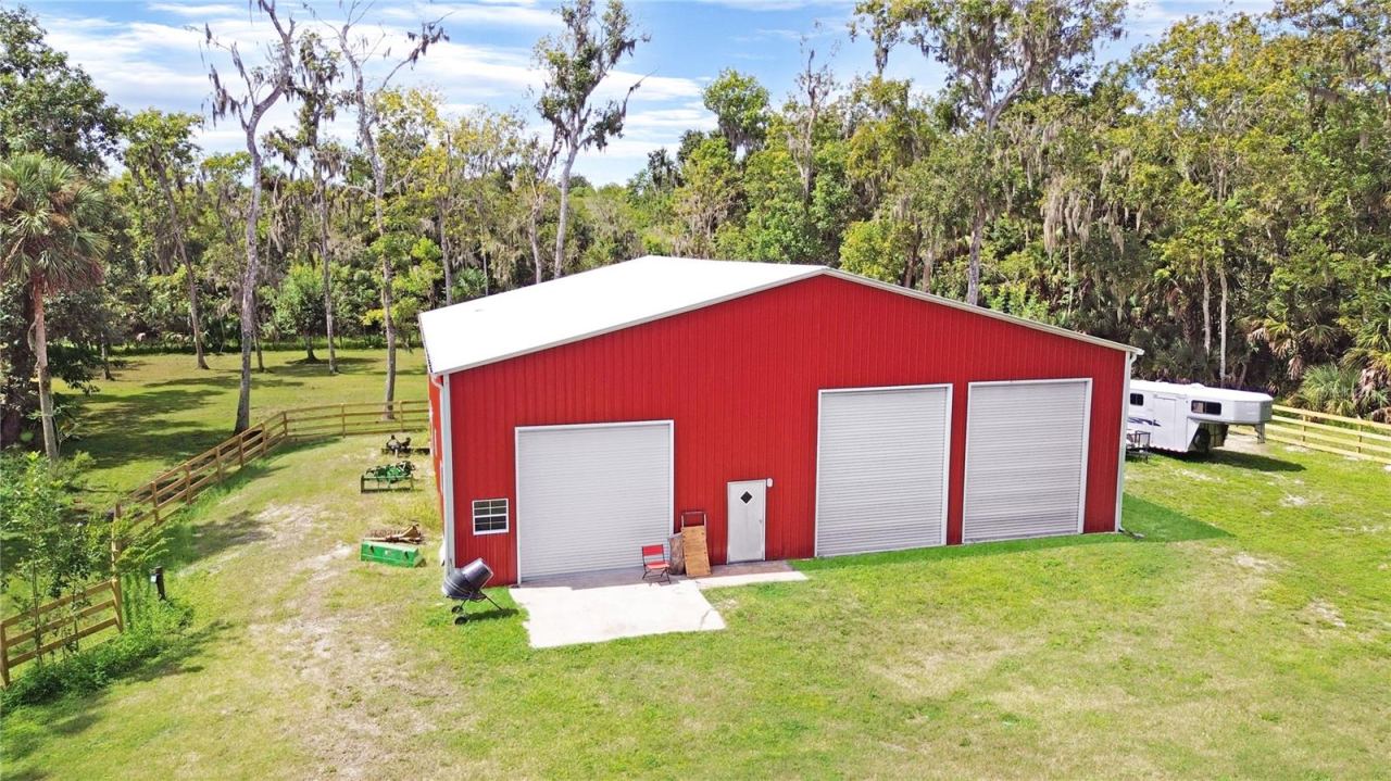 Photo 12 of 20: 60x60 insulated metal building with 14' roll up doors and 16' sidewalls.
