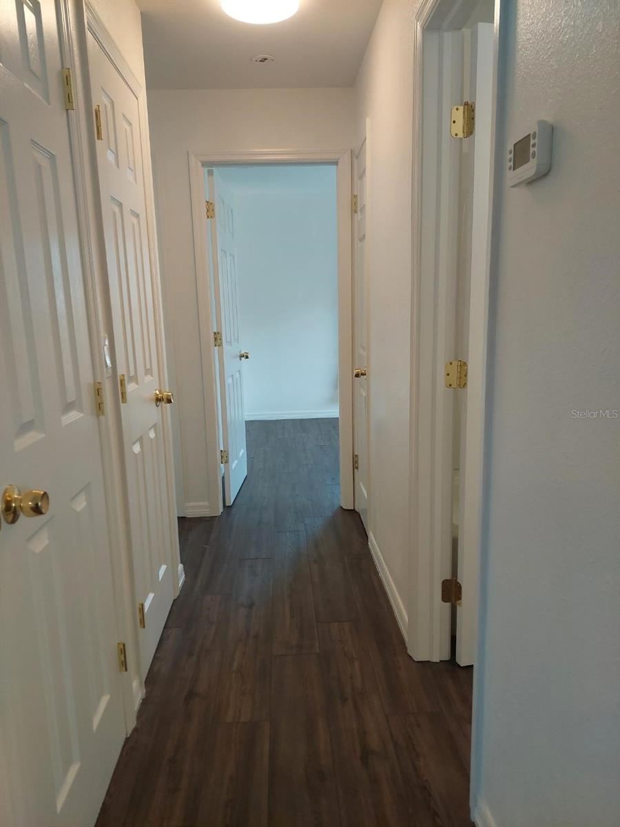 Photo 18 of 20: Hallway towards master bedroom