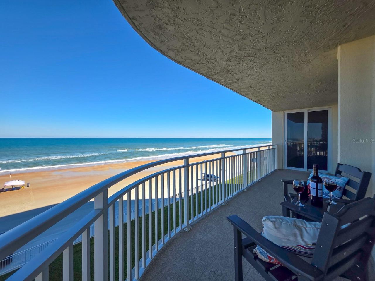 Photo 4 of 20: Wrap around balcony with endless unobstructed views to the south.