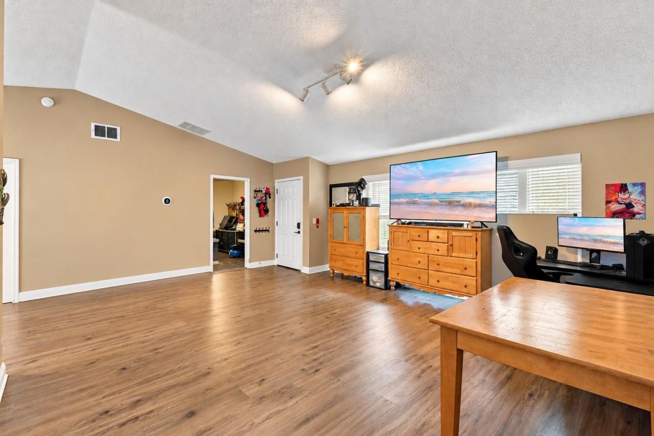 Photo 3 of 20: Front door and garage laundry access.