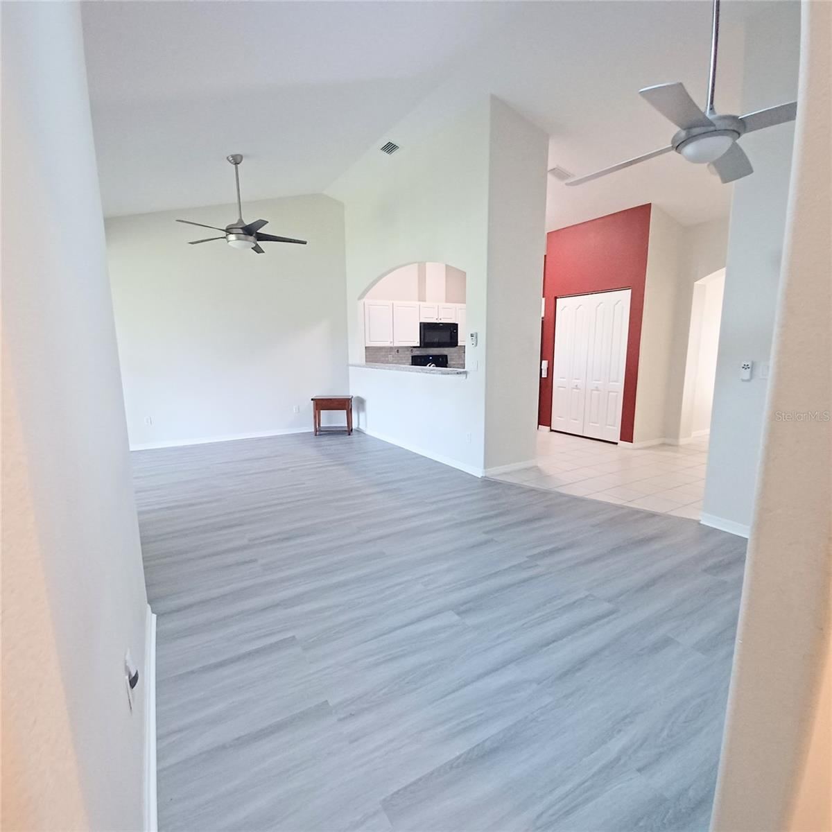 Photo 6 of 17: Partial Great Room with brand new luxury vinyl flooring.