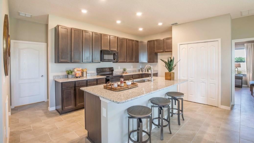 Photo 3 of 20: Model home - actual features may vary.