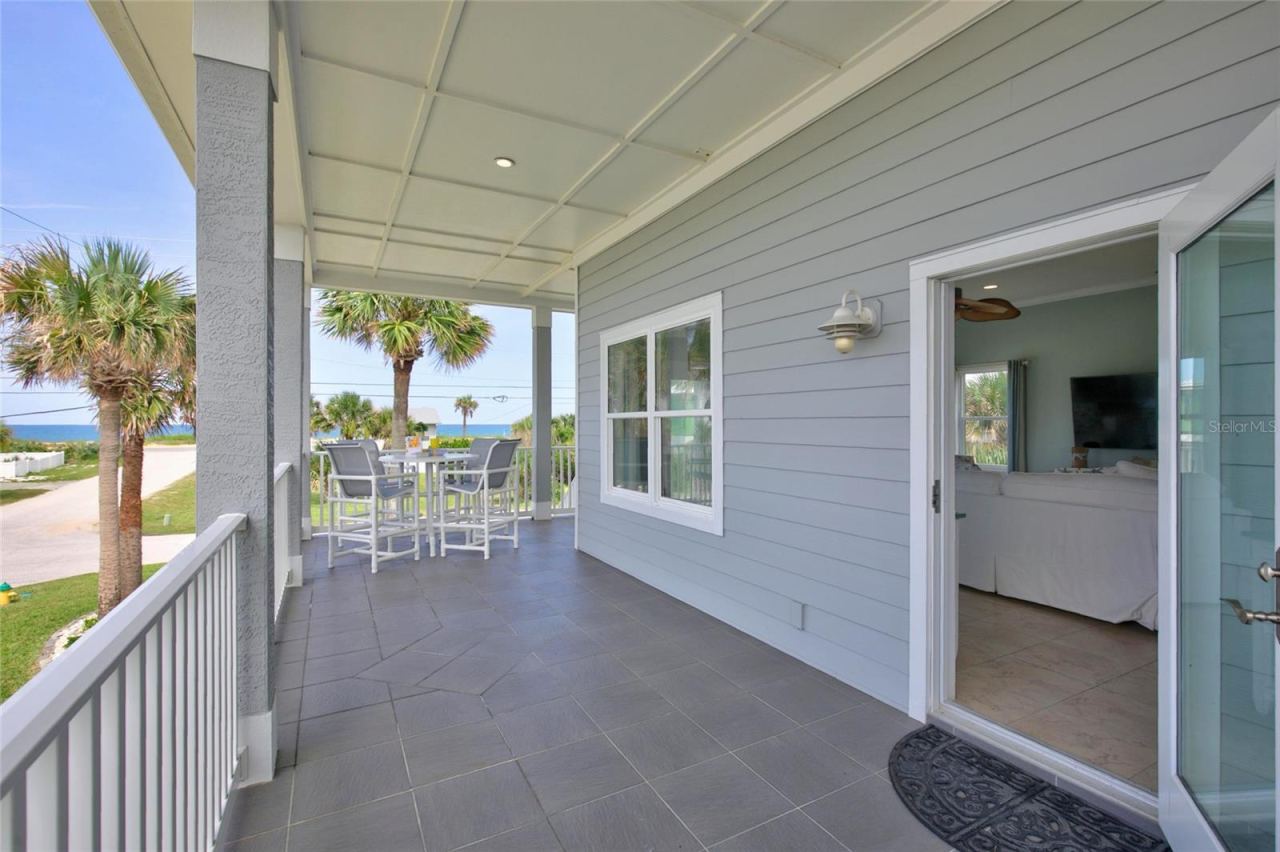 Photo 11 of 20: SIDE ENTRY - WRAP PORCH FLOOR 2 WITH OCEAN VIEWS