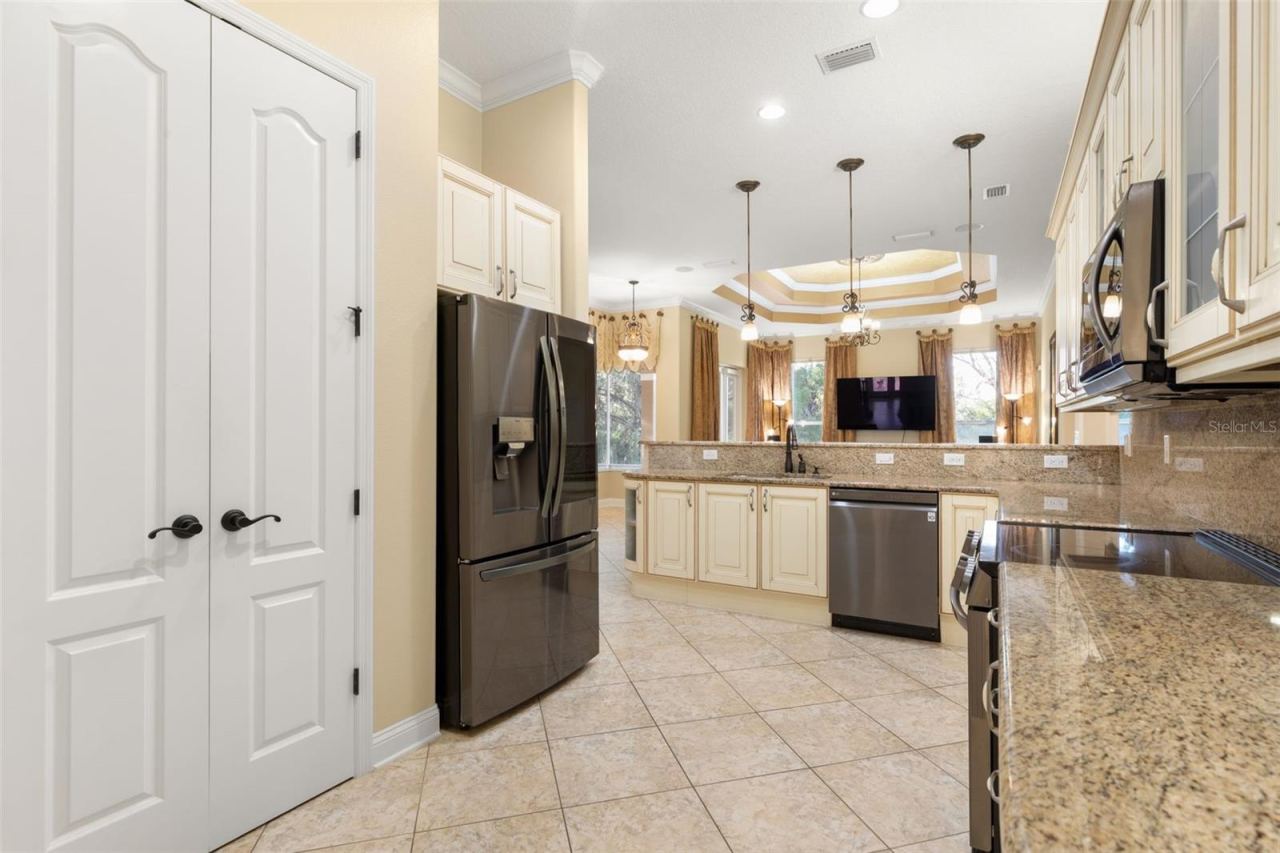 Photo 9 of 20: Generous counter space, abundant cabinetry and a well-planned layout make this kitchen as functional as it is beautiful.