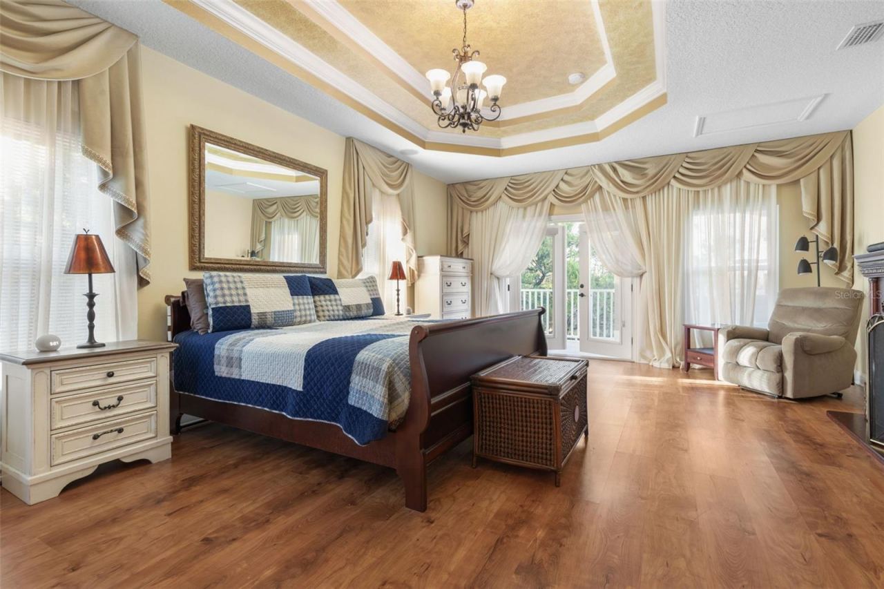 Photo 4 of 20: A versatile upstairs retreat currently used as a primary bedroom, offering a private space to relax and unwind.