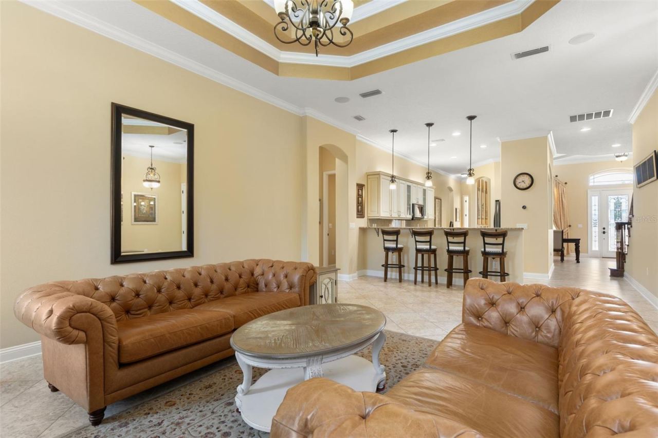 Photo 13 of 20: An open, welcoming layout offers a view toward the home's front entrance, showcasing the thoughtful connection between living spaces.