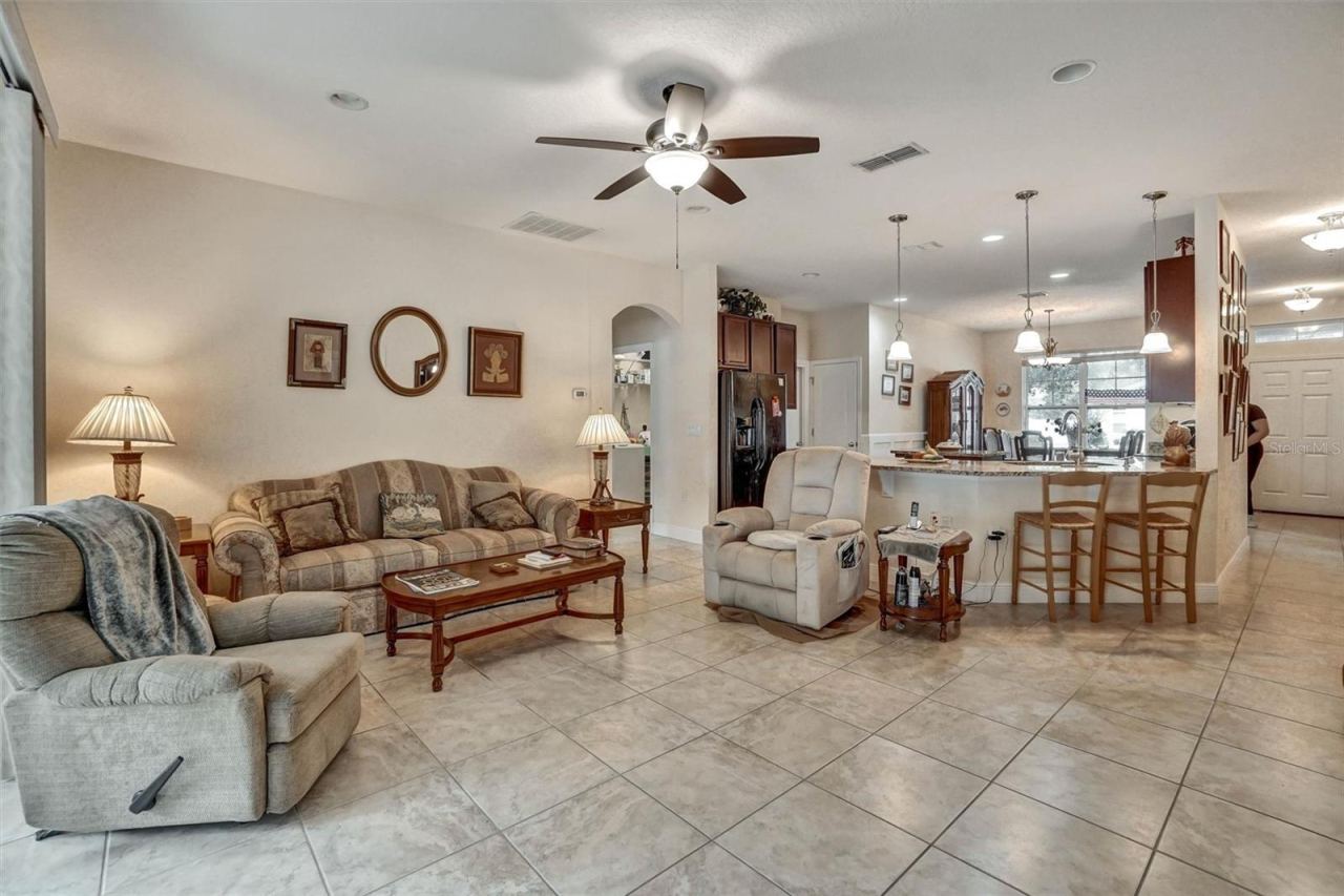 Photo 5 of 20: Open living area with comfortable seating and a seamless dinning room and kitchen connection