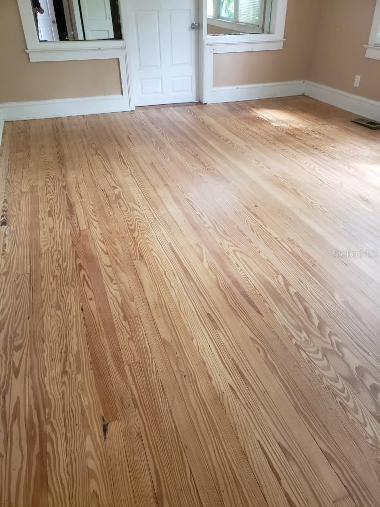 Photo 5 of 20: 3.1.2025 refurbished floors downstairs. (Primary BR)