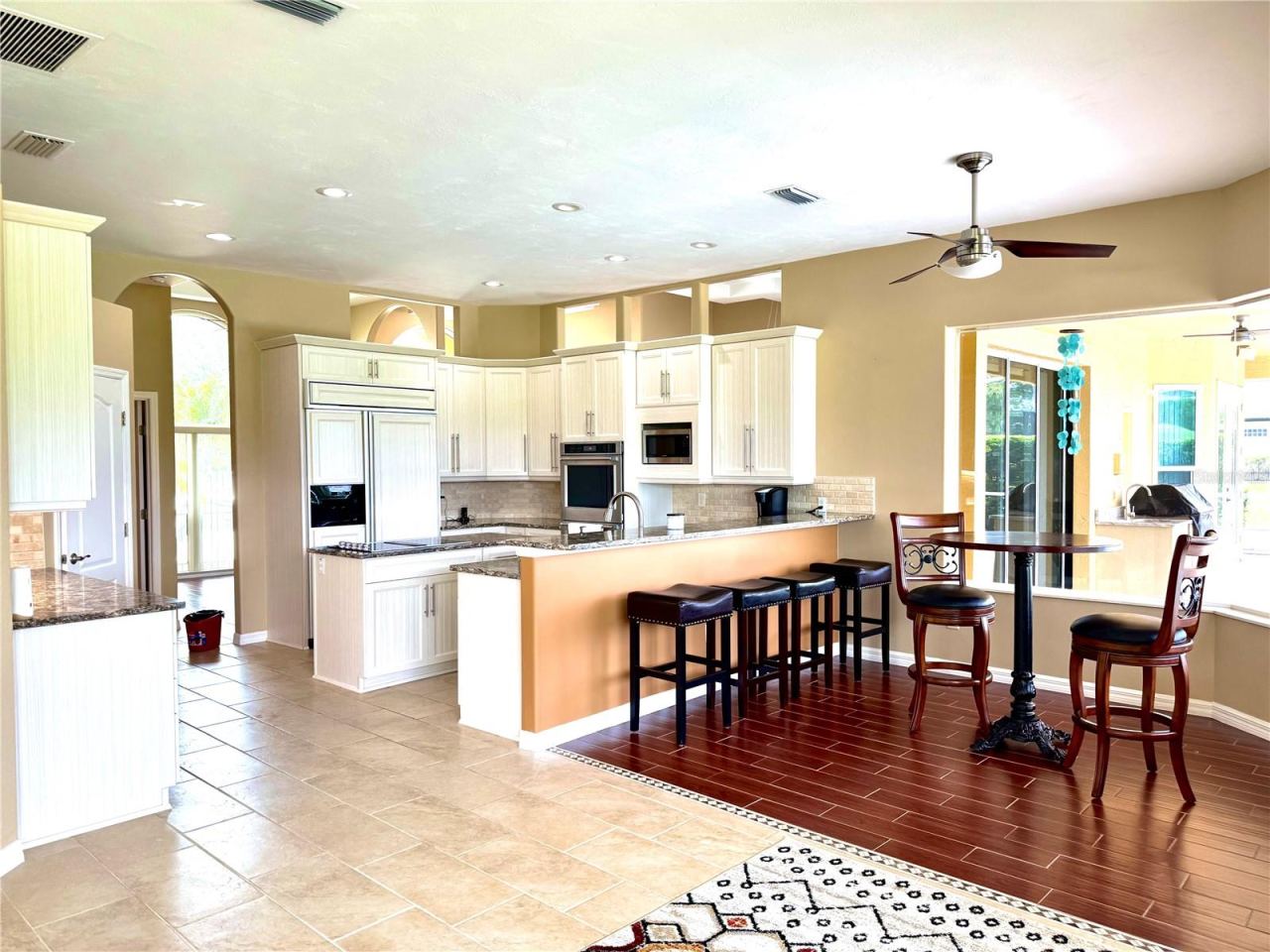 Photo 12 of 20: open concept family room open to kitchen