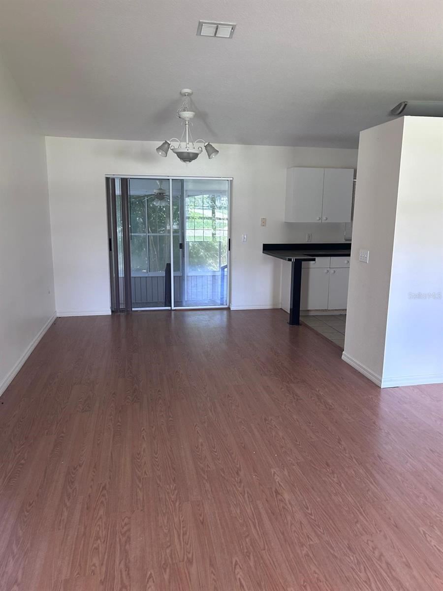 Photo 7 of 20: Living Room and Dining Room
