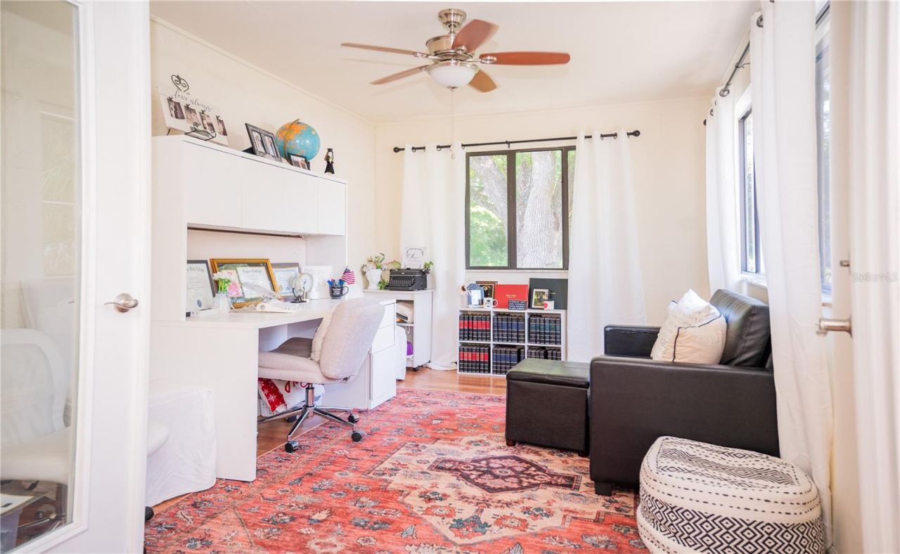 Photo 12 of 20: Another view of the spacious home office, perfect for a dedicated workspace or creative studio.