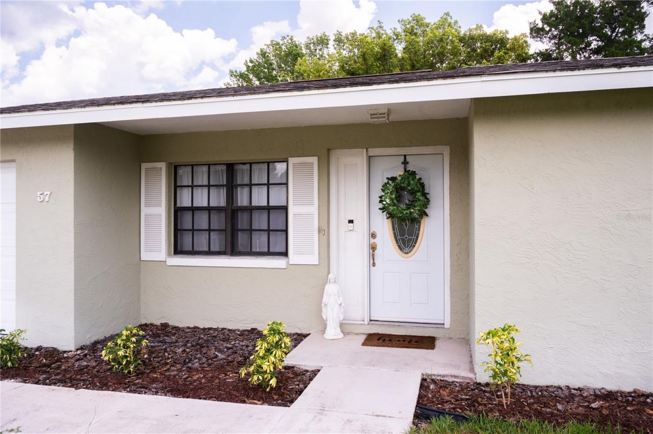 Photo 5 of 20: Front entrance featuring a view of the front door and integrated Ring security system.