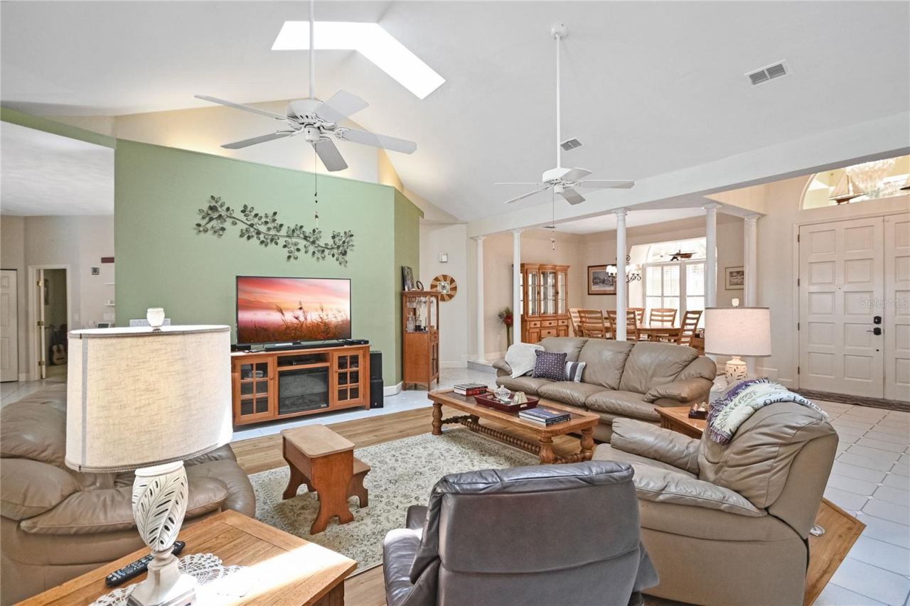 Photo 13 of 20: Great room with sun windows and high ceilings