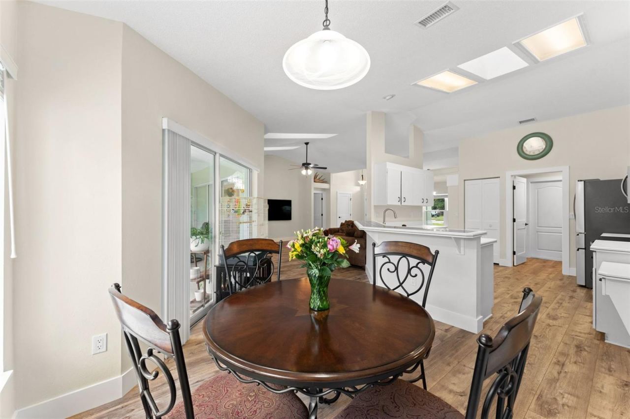 Photo 4 of 20: Breakfast nook views to the kitchen and living areas.