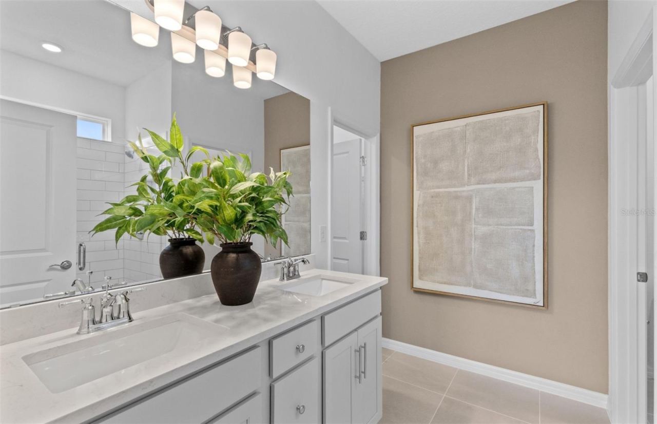 Photo 17 of 20: Model Home Design Only. Pictures and furnishings are for illustrative purposes only. Elevations, colors and options may vary. Furniture is for model home staging only.
