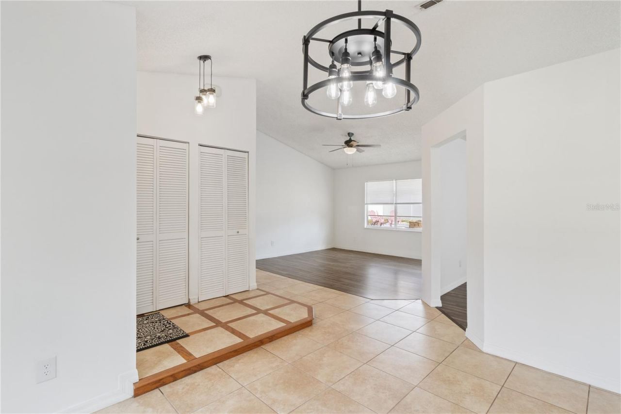 Photo 5 of 20: View from Dining Area into Living Room and Entry