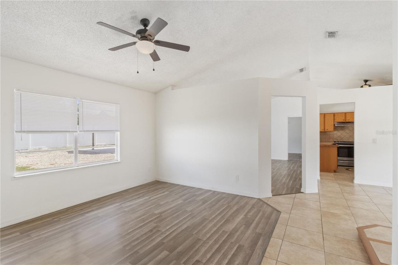 Photo 14 of 20: Living Room and Foyer